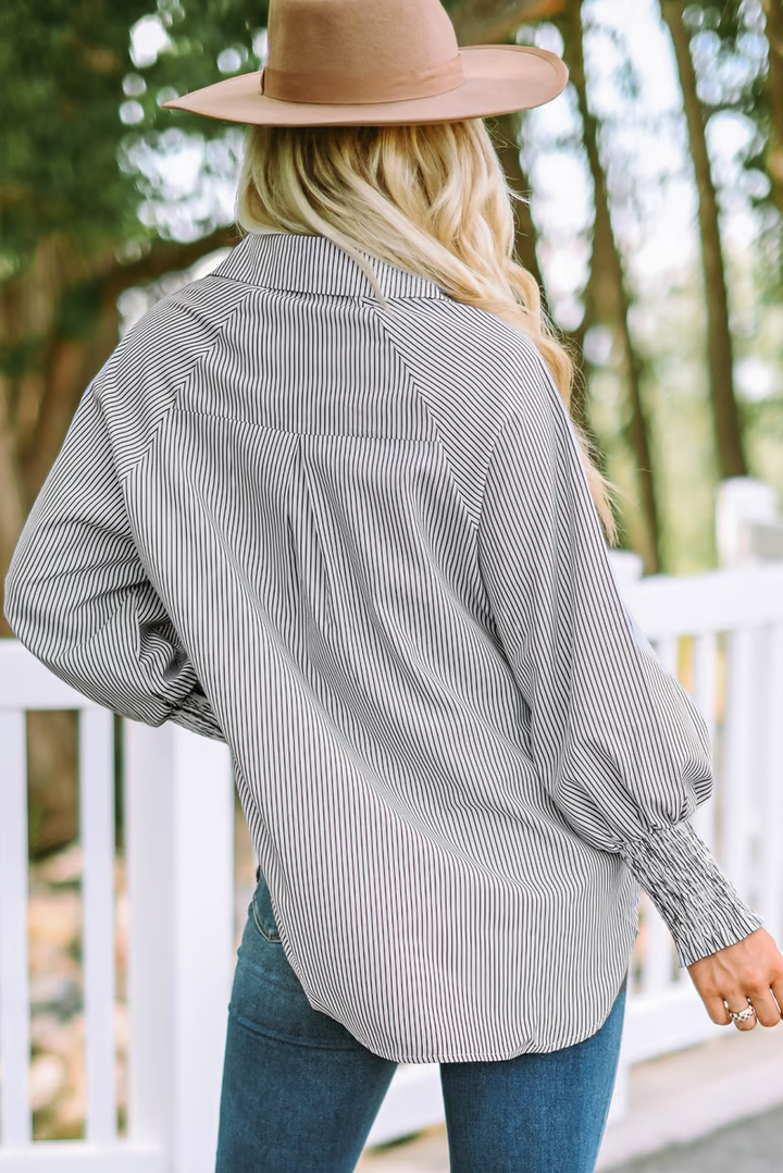 Mid-length smocked shirt with striped lapel and oversized drawdown sleeves