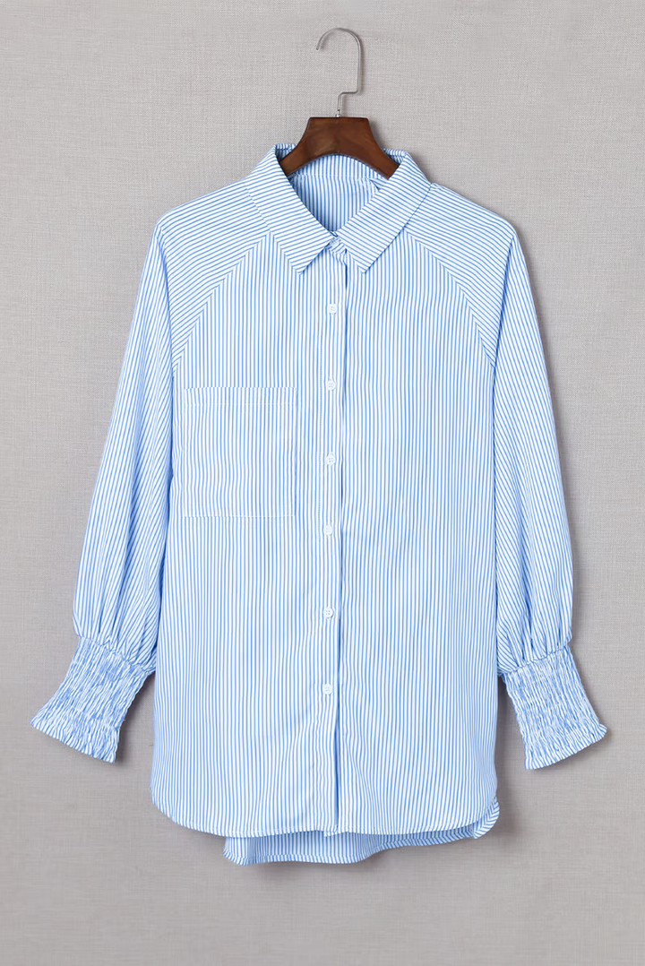 Mid-length smocked shirt with striped lapel and oversized drawdown sleeves