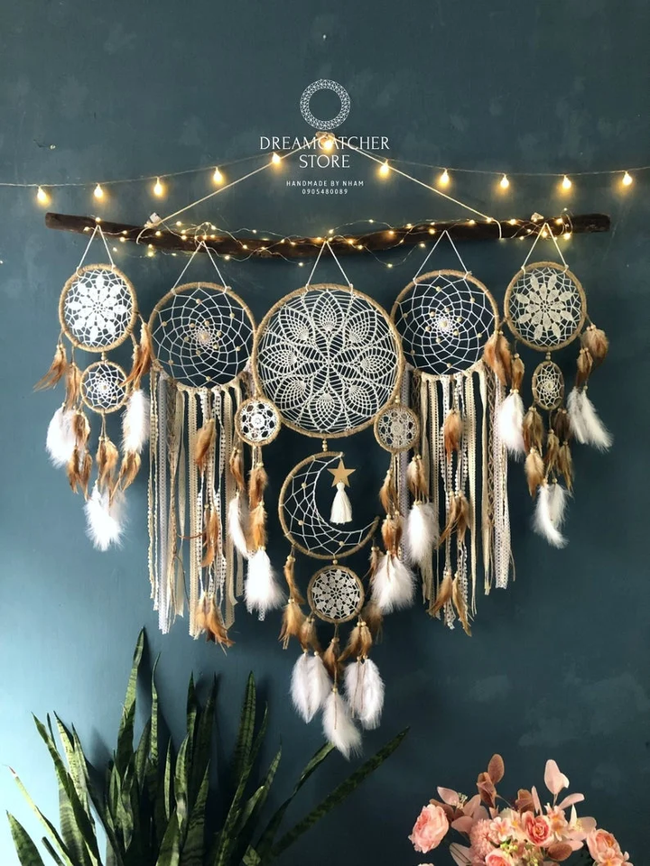 Dreamcatcher moon and stars hanging over the bed