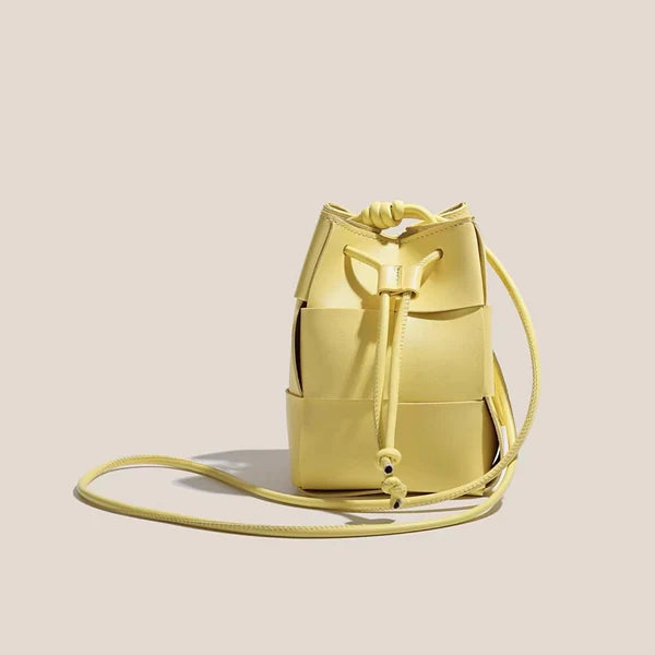 WOVEN BUCKET CROSSBODY BAG