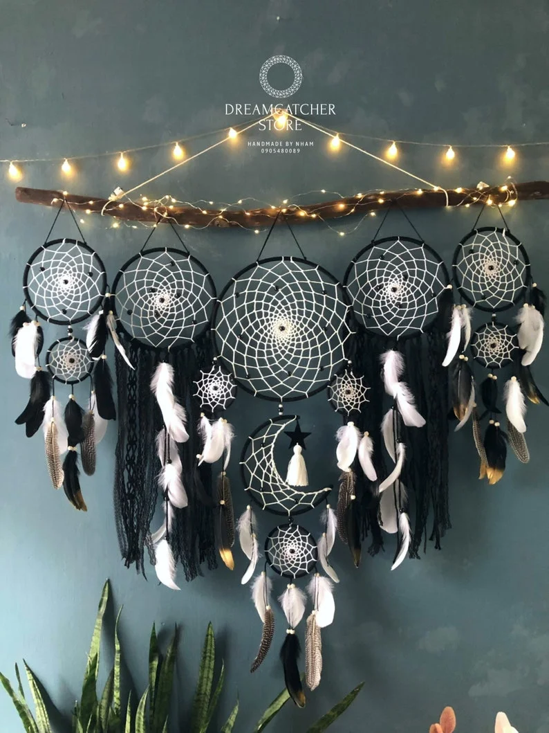 Dreamcatcher moon and stars hanging over the bed