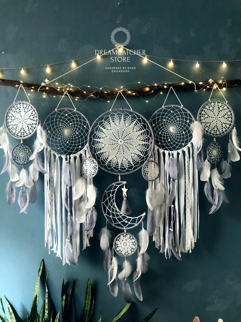 Dreamcatcher moon and stars hanging over the bed