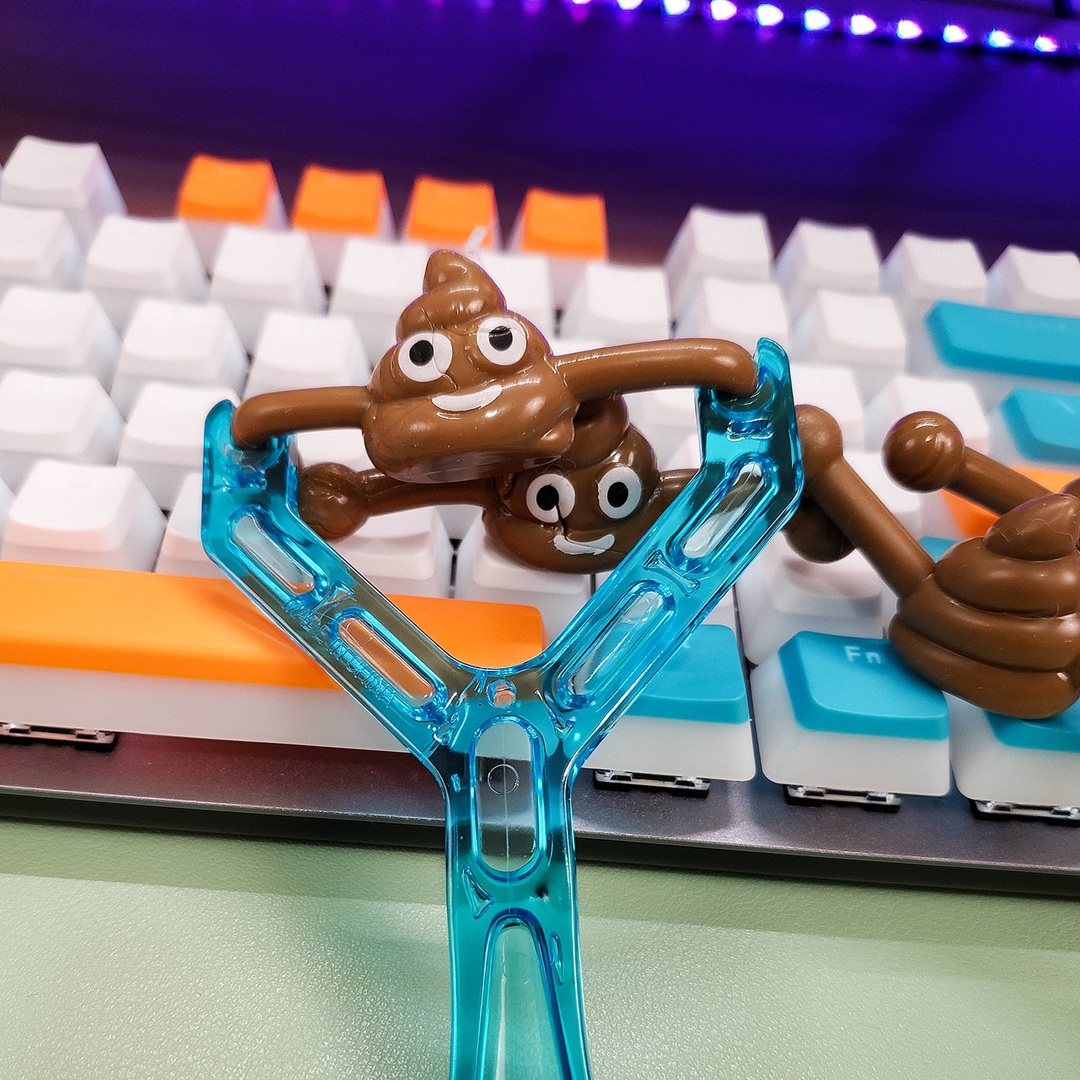 Smiley Poop Slingshot Toy