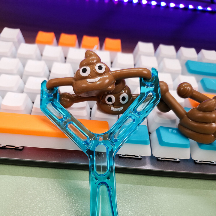 Smiley Poop Slingshot Toy