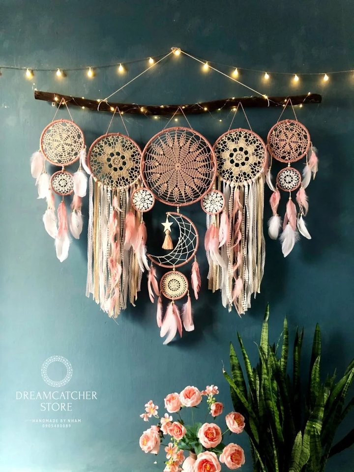 Dreamcatcher moon and stars hanging over the bed